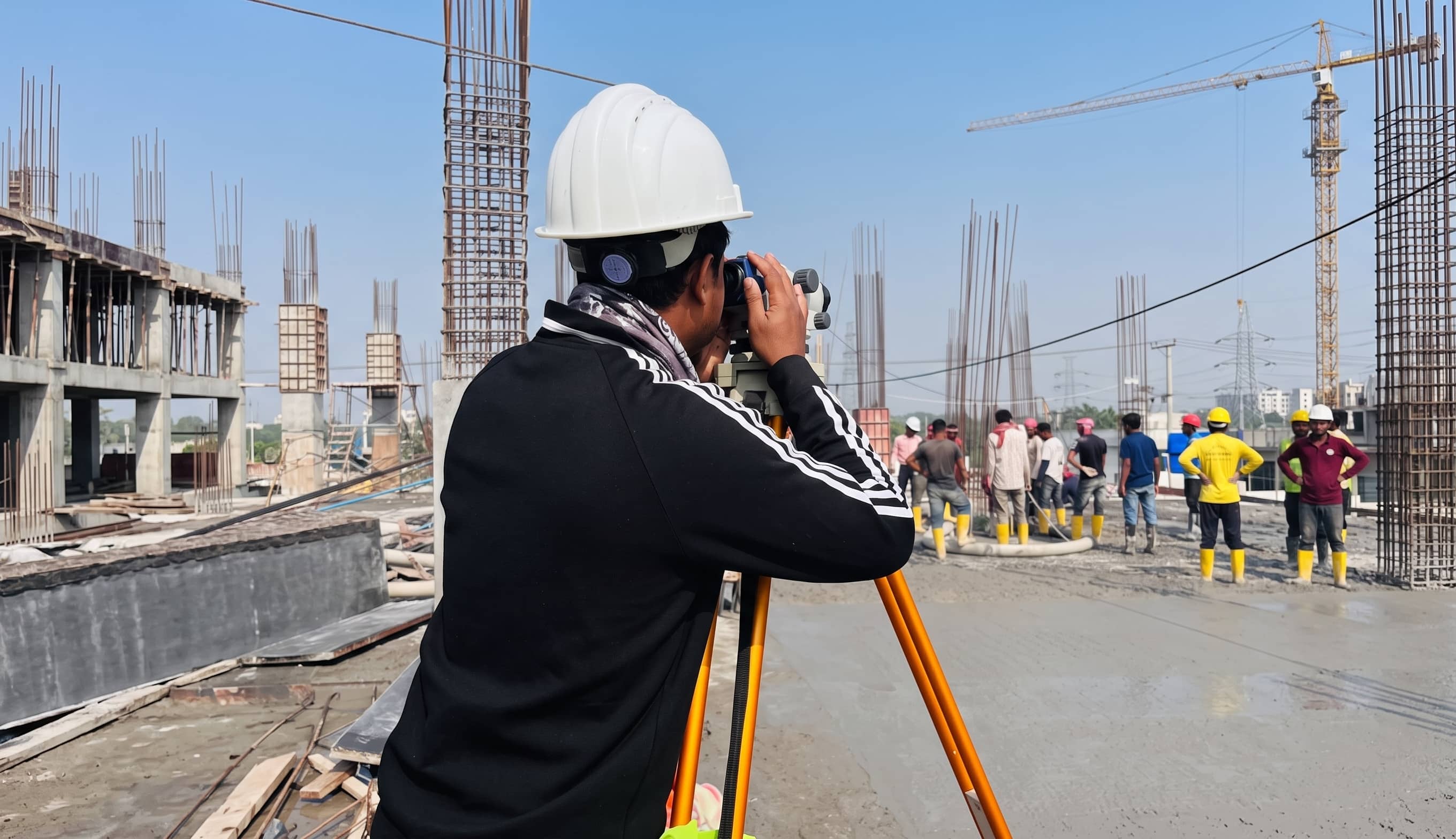 Surveying at Supreme Quality Construction site